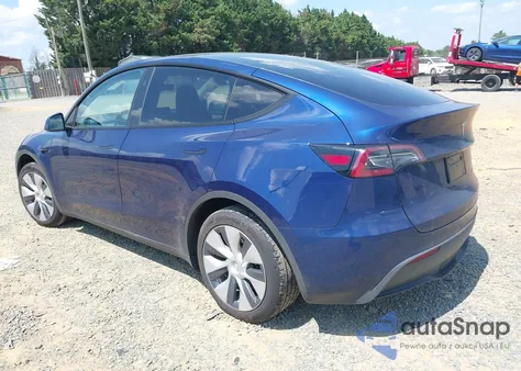 2023 Tesla Model Y Awd/Long Range Dual Motor All-Wheel Drive z USA, uszkodzony, nr VIN 7SAYGDEE6PF851180